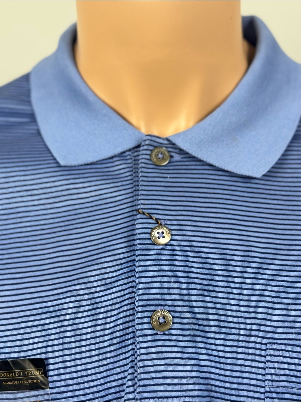 Men's Light Blue Striped Polo Shirt by Donald J. Trump